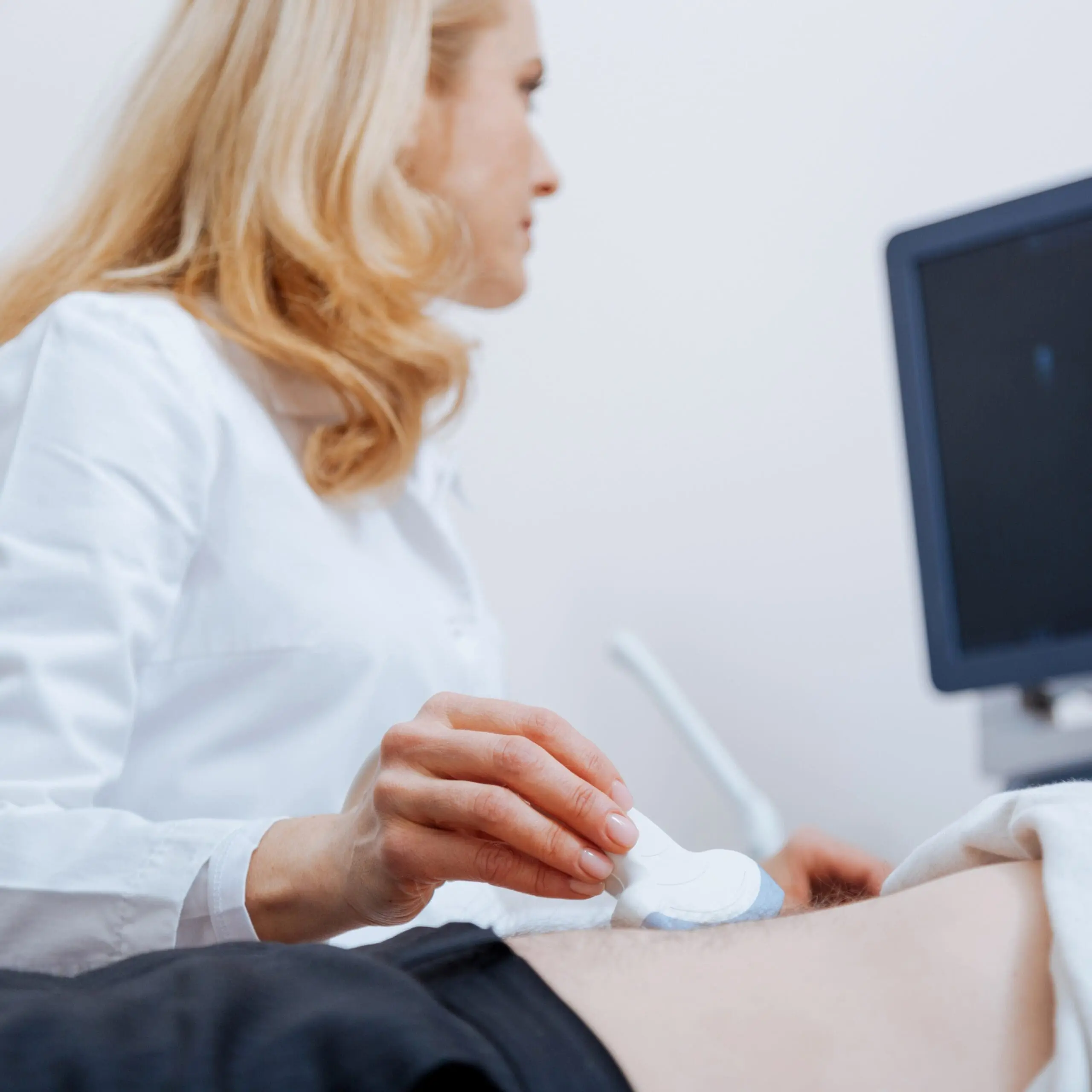 A woman receiving an ultrasound at Expectations Women's Center