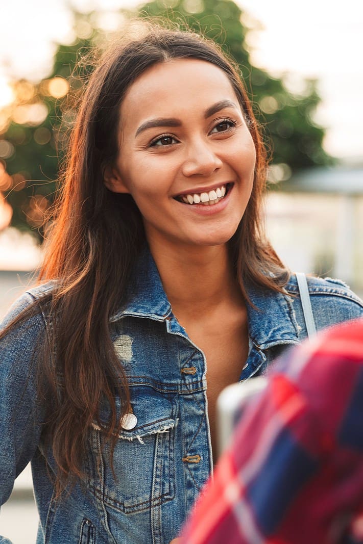 A woman happy because she received Free Pregnancy Services at Expectations Women's Center