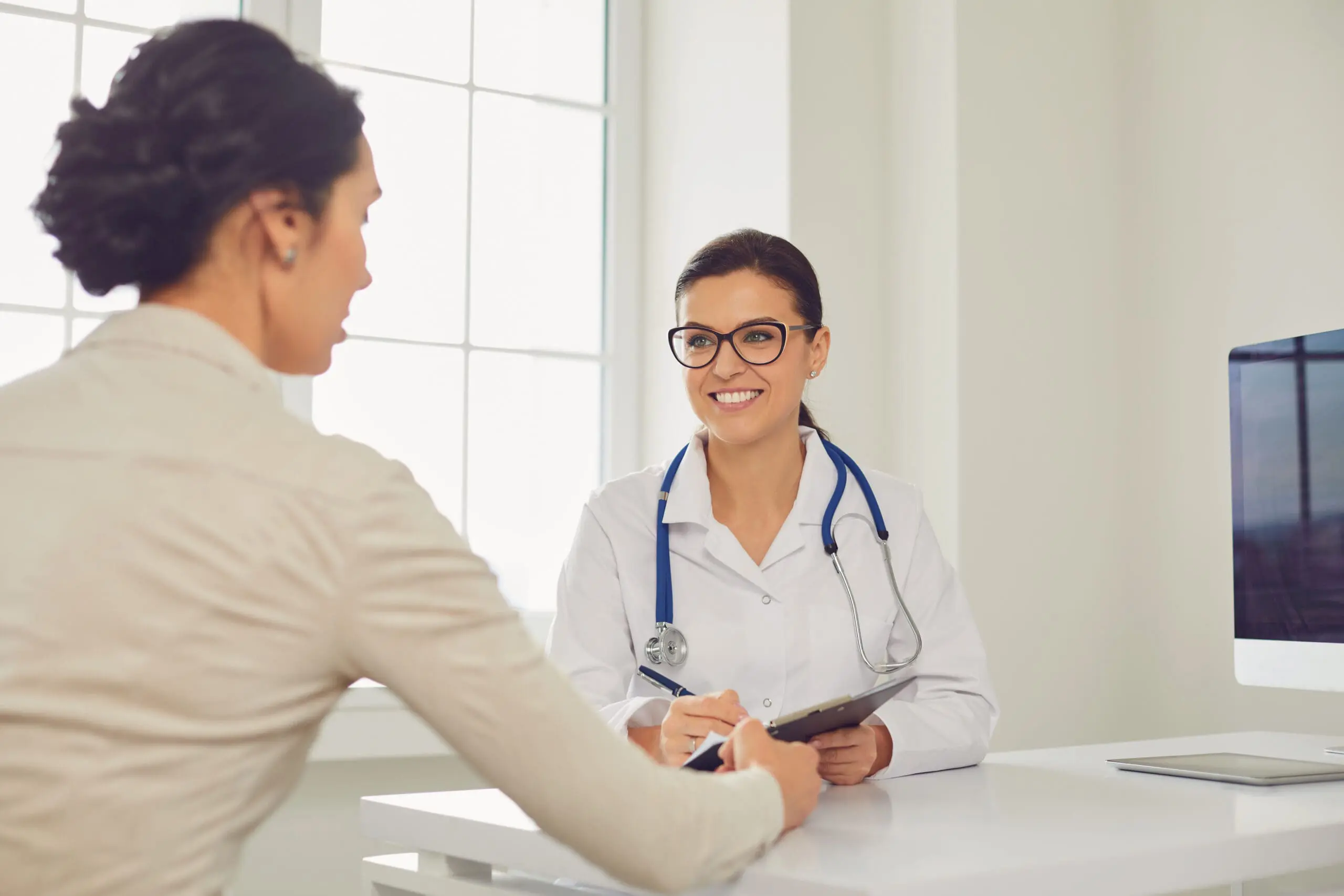 Two women discussing "Why You Need an Ultrasound Before Abortion in Lewisburg and Williamsport PA"