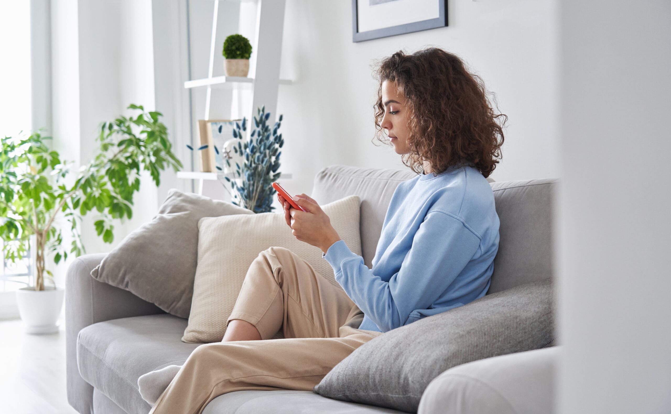 A woman searching "Can I Get Abortion Pills Over the Counter?"