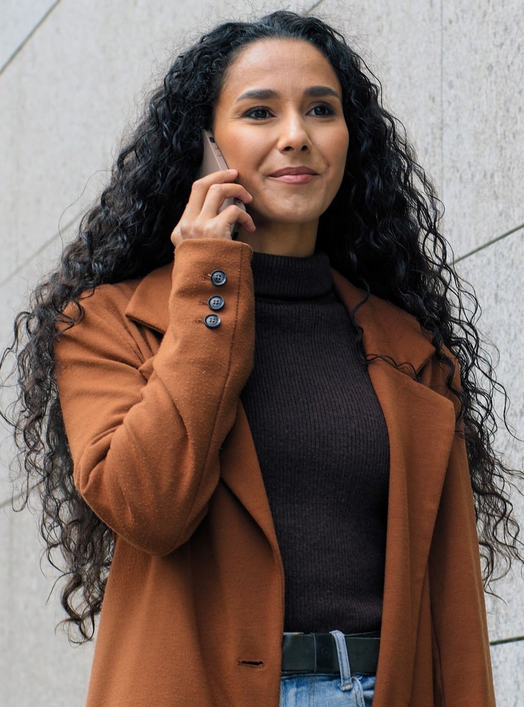 A woman searching on her phone for Free Parenting Education