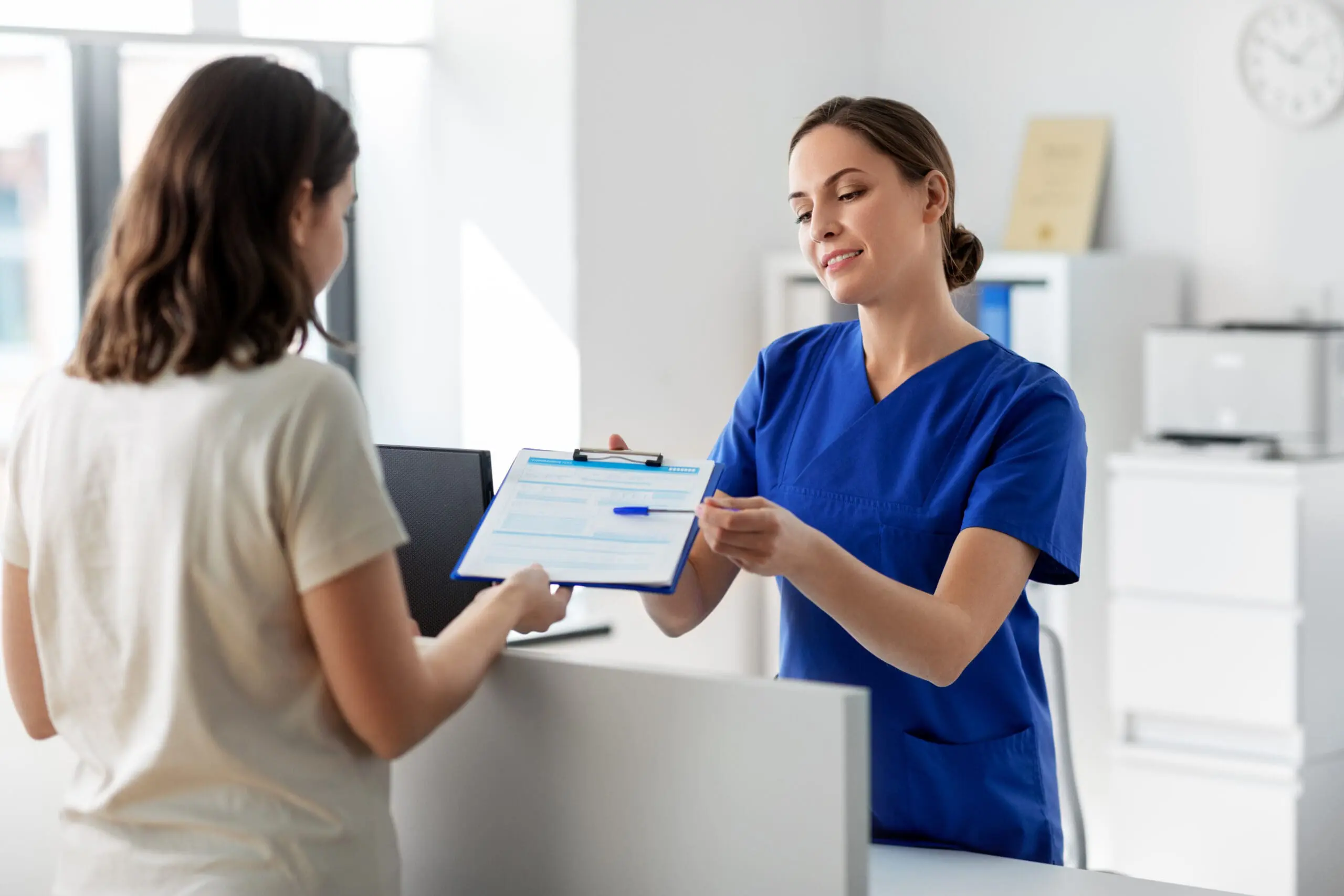 A woman asking a mdeical professional "How Much Does the Abortion Pill Cost?"