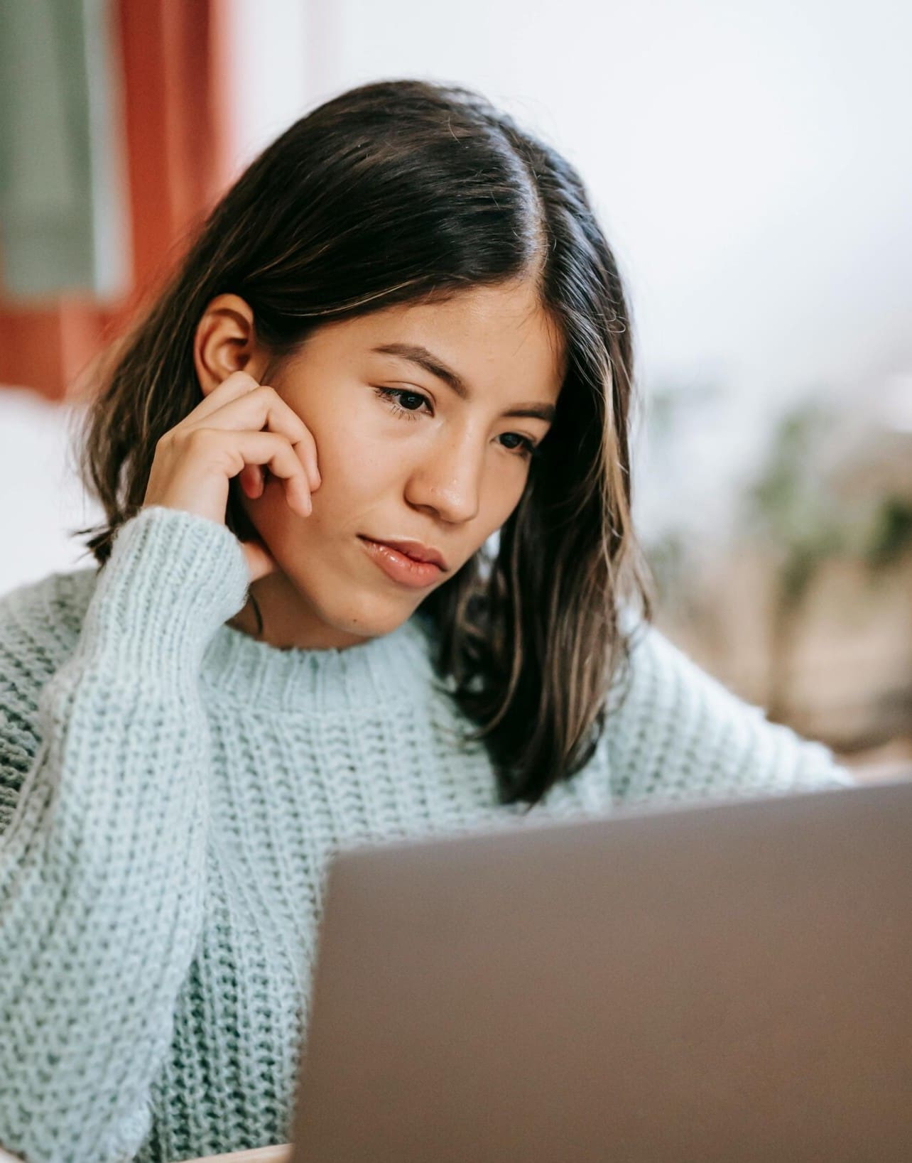 A woman researching "pregnancy options education."