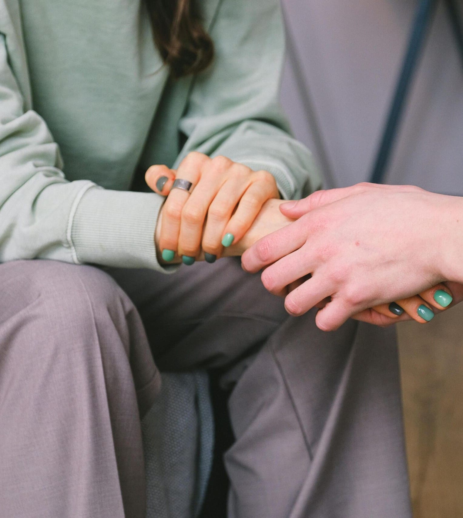 A woman receiving community resources & support referrals at Expectations Women's Center
